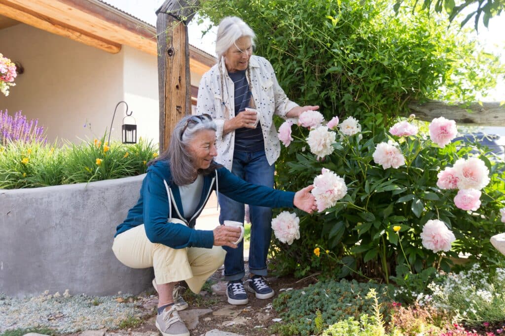 family tending garden